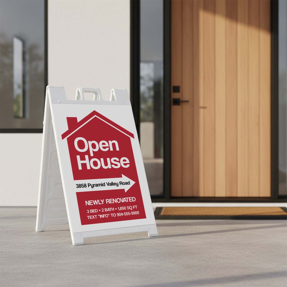 An open house sandwich board sign featuring a newly renovated message
