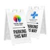 Two examples of the Parking This Way sandwich board sign with a company logo