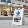 Am A-frame sign for parking this way near a medical center