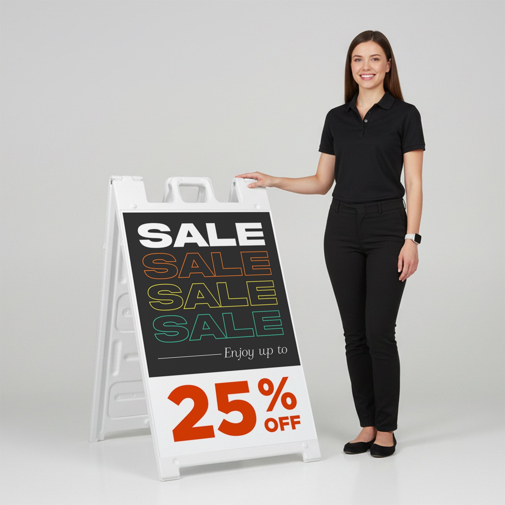 A woman standing next to the sale A-frame sign with her hand on the top of the sign