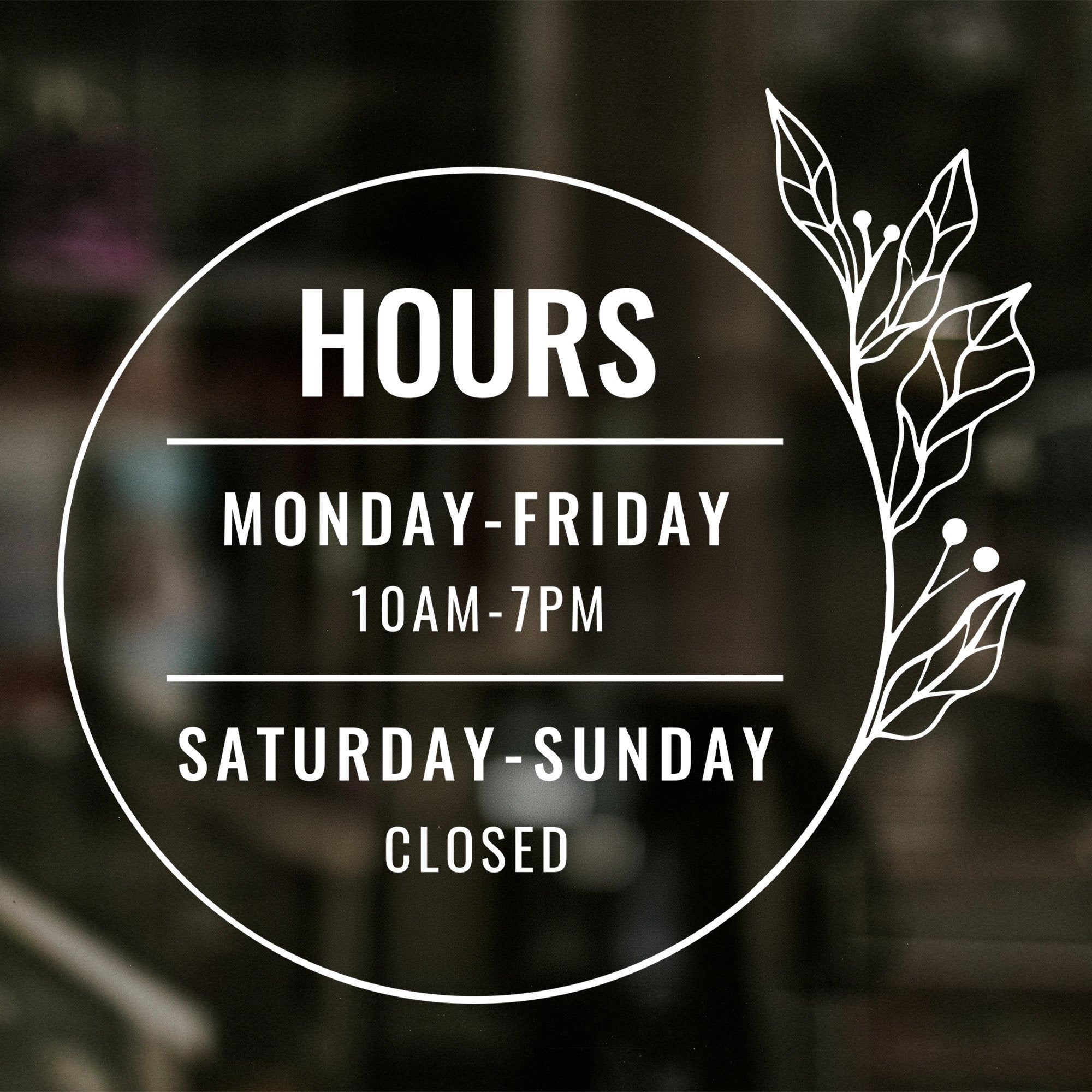 Custom Business Hour Sign with Floral Design displayed on a window