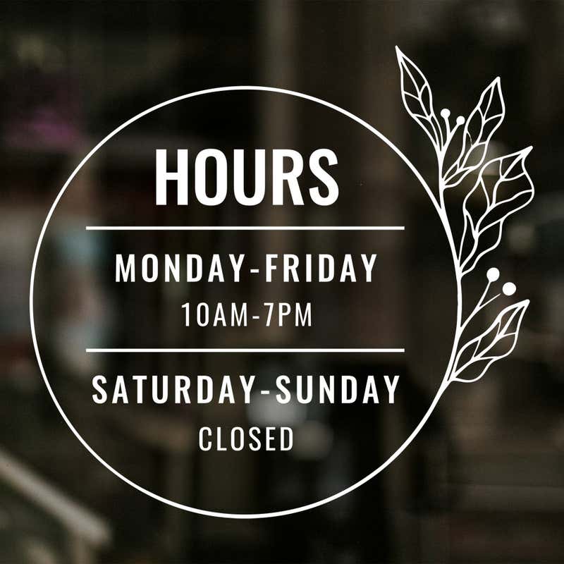 Custom Business Hour Sign with Floral Design displayed on a window