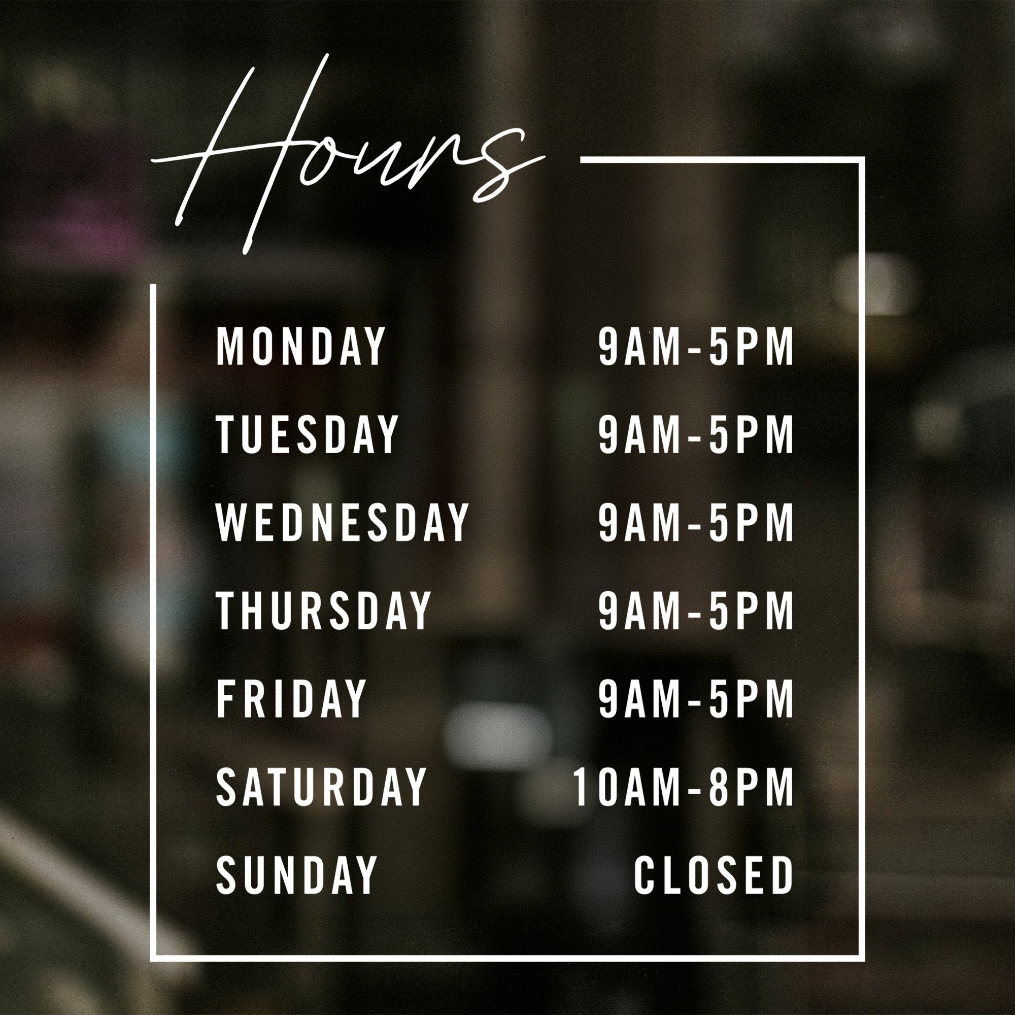 Modern business hours decal displayed on a store window
