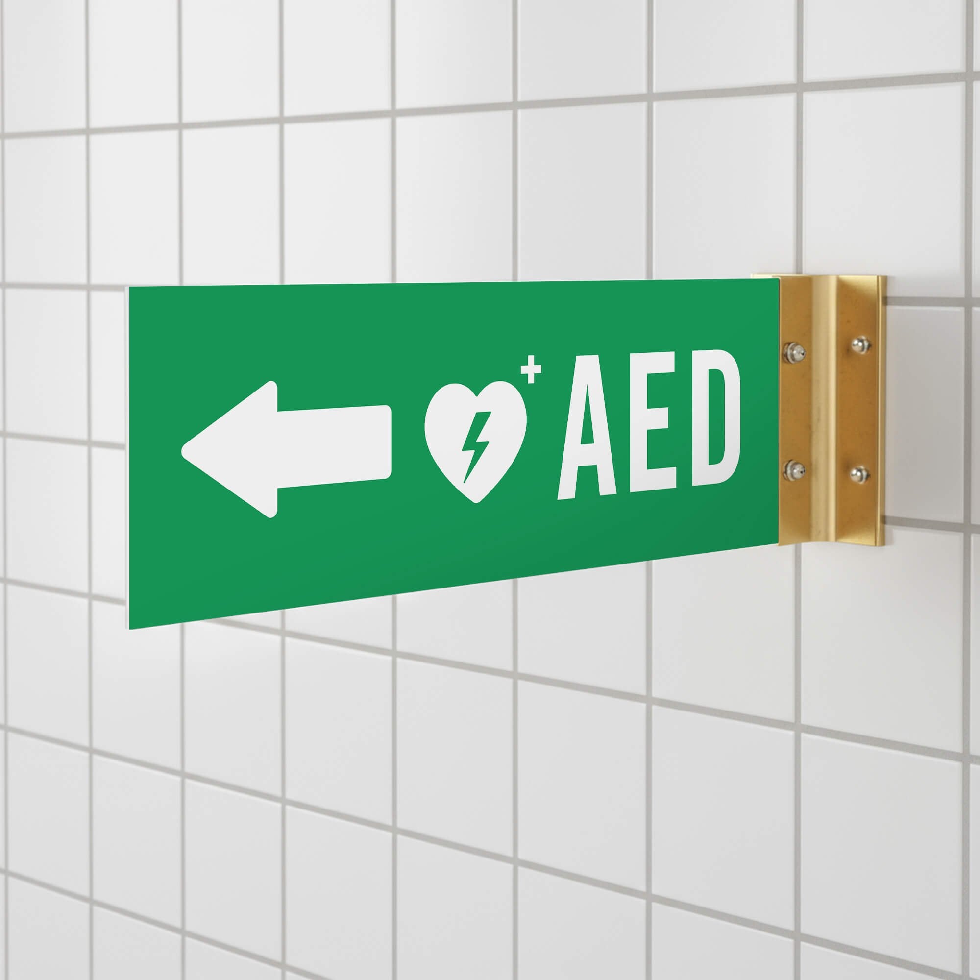 Green projecting AED sign in a bathroom