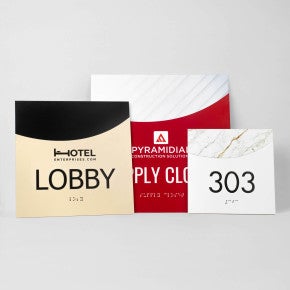 Three different sizes and designs of the modern arch 2-layered ADA sign