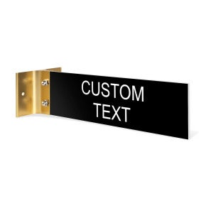 2” x8” “Custom Text” Corridor sign with black material color, white engraved text, and yellow gold holder on a white background.