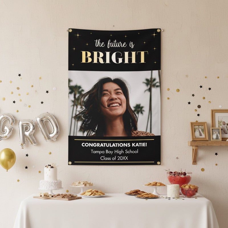The Future Is Bright Graduation Banner hanging on a wall at a party