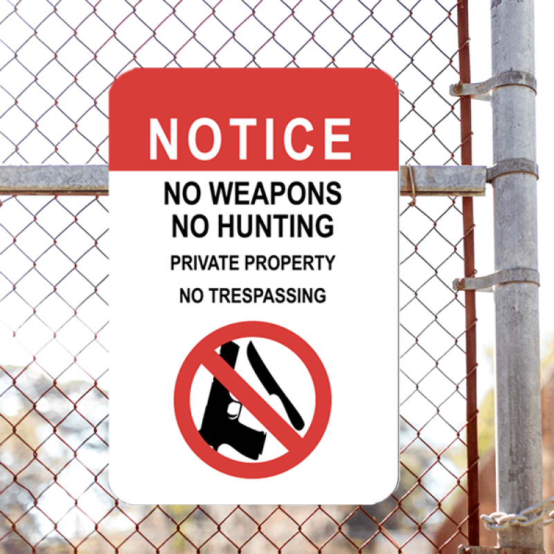 Mounted Vertical No Weapons or Hunting Sign