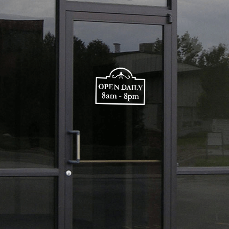 Open Daily Business Hours Die Cut Decal on a storefront window