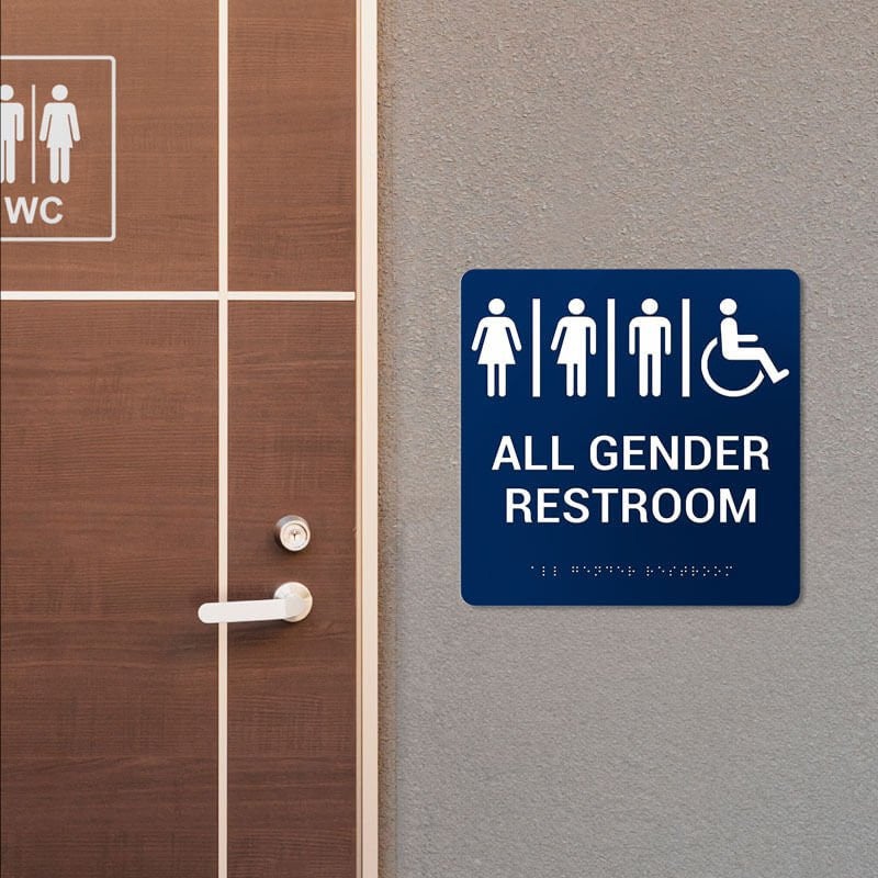 All Gender Restroom ADA Sign on a wall next to the bathroom