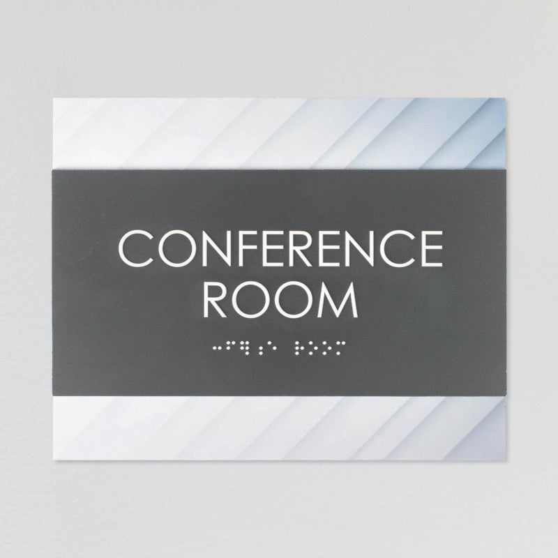 A design example of the horizontal 2-layer ADA sign for a conference room with a gray foreground and minimal diagonal background
