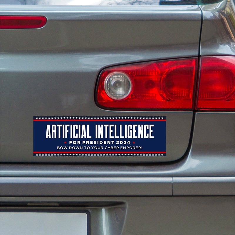 Artificial Intelligence Bumper Sticker below a gray car's tail light
