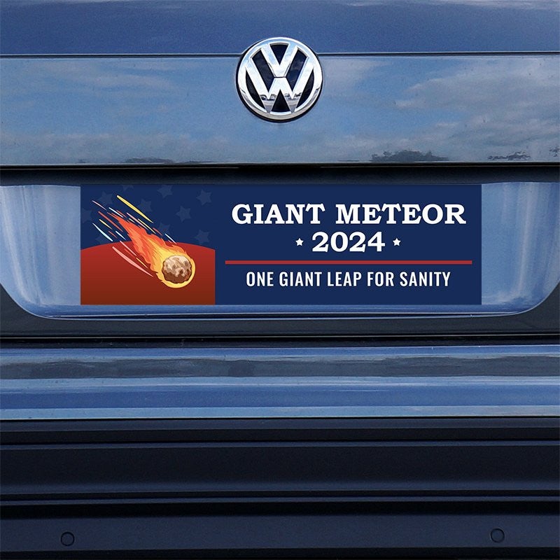 Giant Meteor Bumper Sticker on a gray car