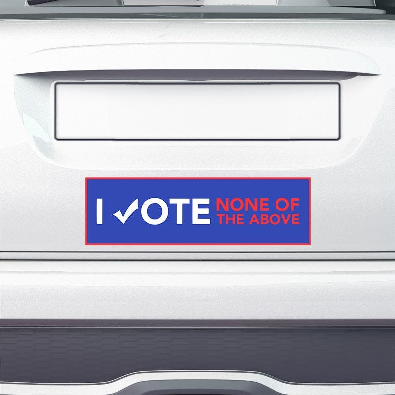 None of the Above Political Bumper Sticker on the bumper of a white car