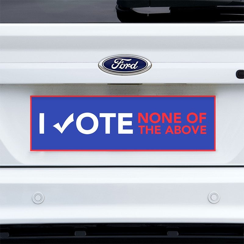 None of the Above Political Bumper Sticker on a white truck