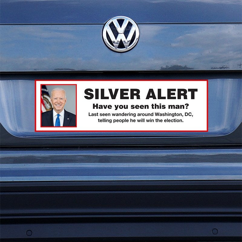 Silver Alert Political Bumper Sticker on a gray car