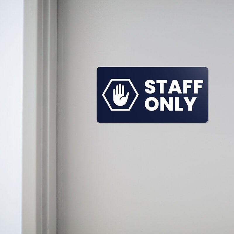 Engraved plastic sign for a staff only entrance