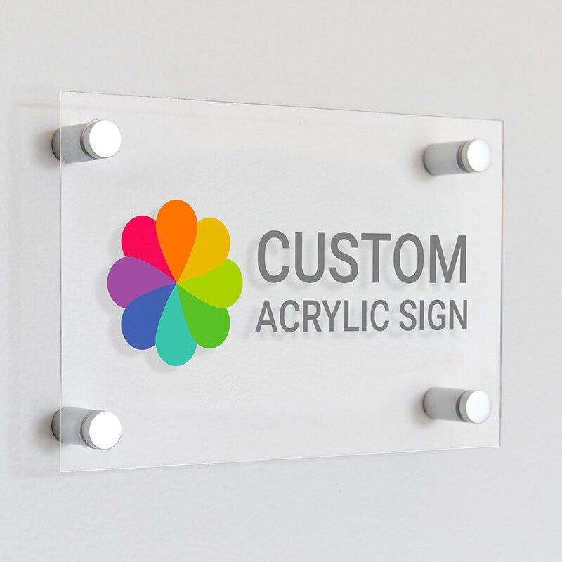 Large horizontal custom acrylic signs with a colorful logo