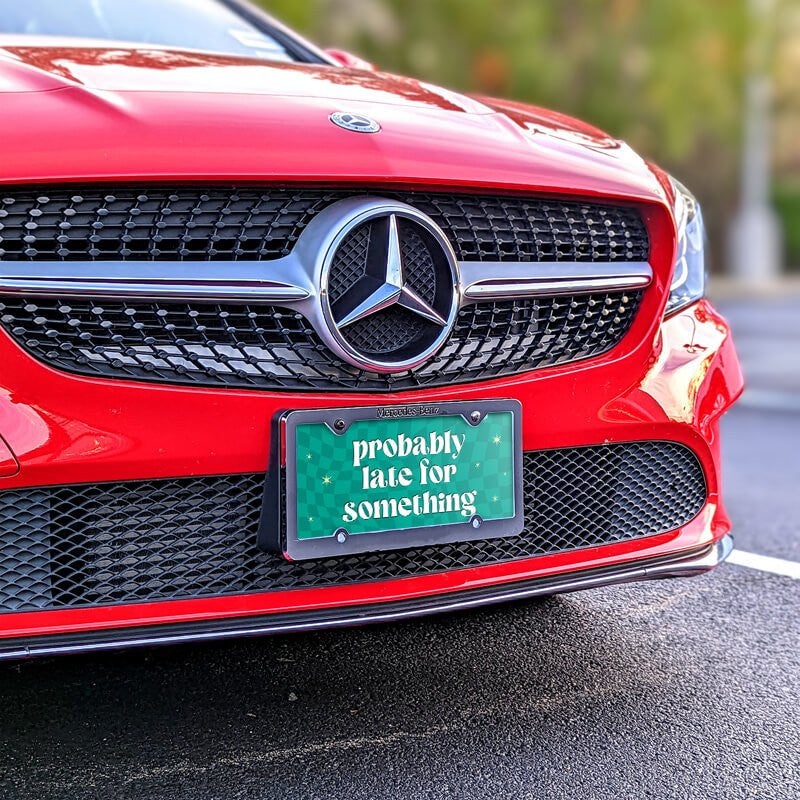 Probably Late front license plate on a red car