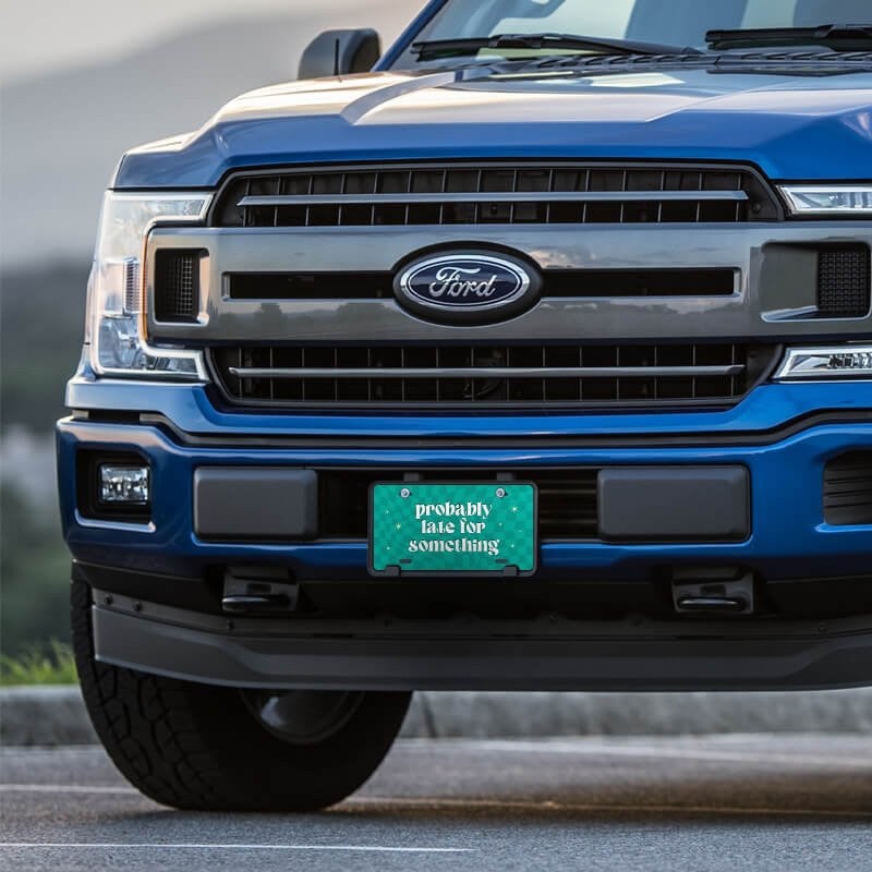 Probably Late front license plate on a blue truck
