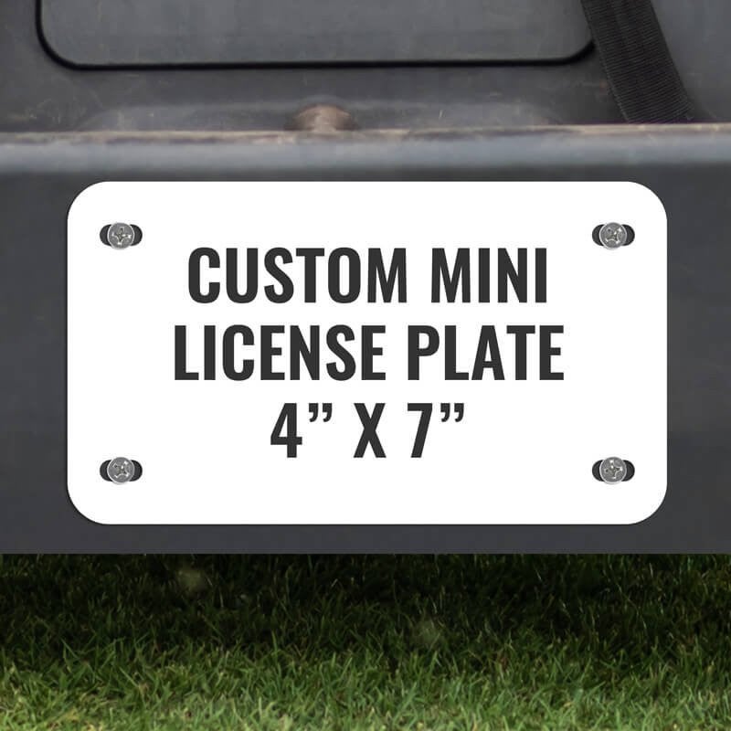 Custom Mini License Plate for Golf Carts 4x7 Shown on a Gold Cart