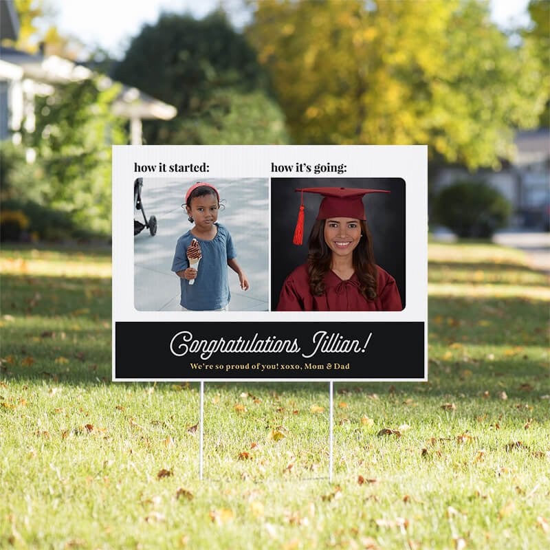 Baby photo graduation yard sign displayed in a sunny yard