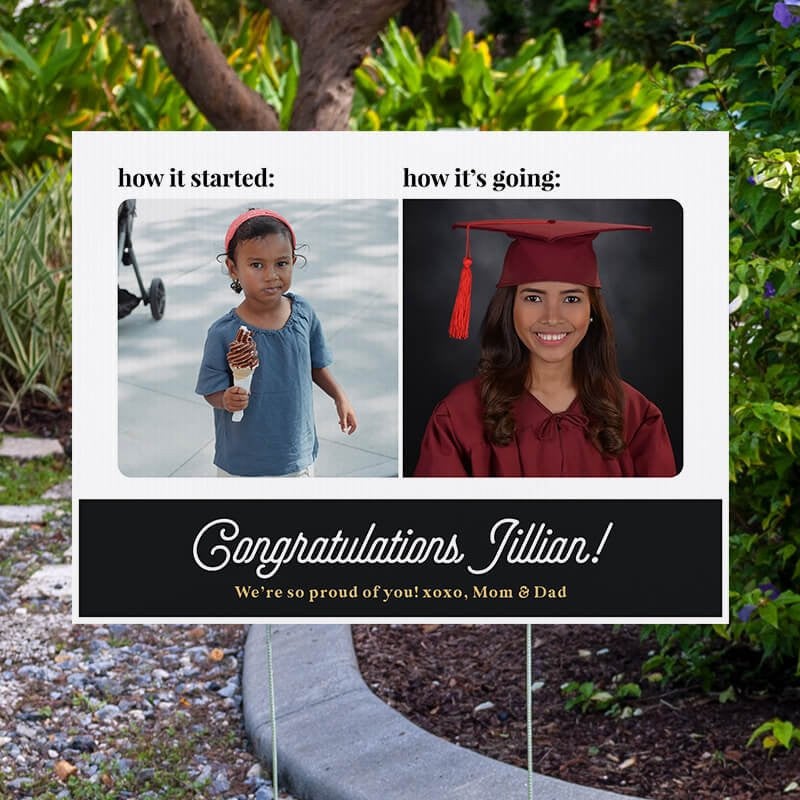 Baby photo custom graduation yard sign displayed next to a pathway