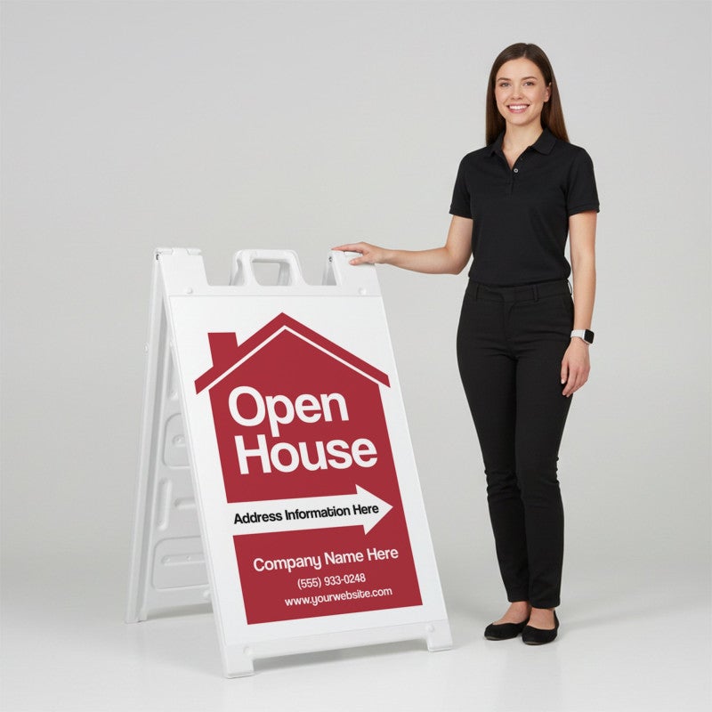 A woman standing next to an open house A-frame sign with her hand on the top of the sign