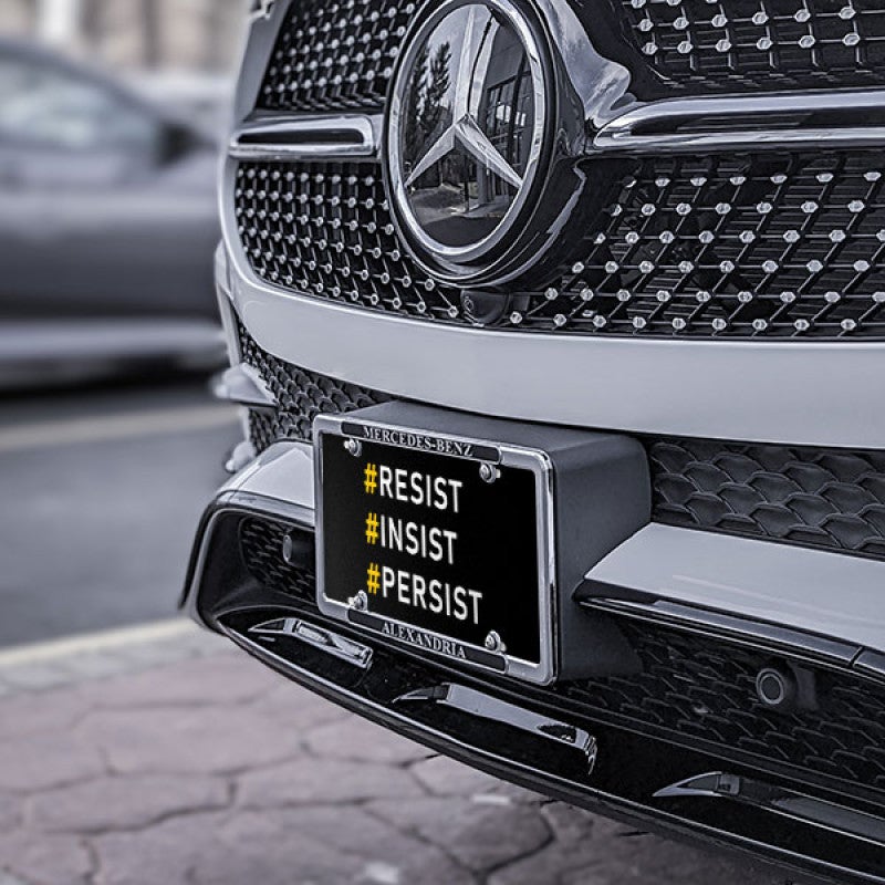 Front License Plate On Black Car
