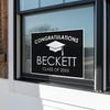 Congratulations Grad Cap Graduation Yard Sign in a Window