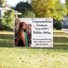 Floral Design and Note Graduation Yard Sign in a front yard