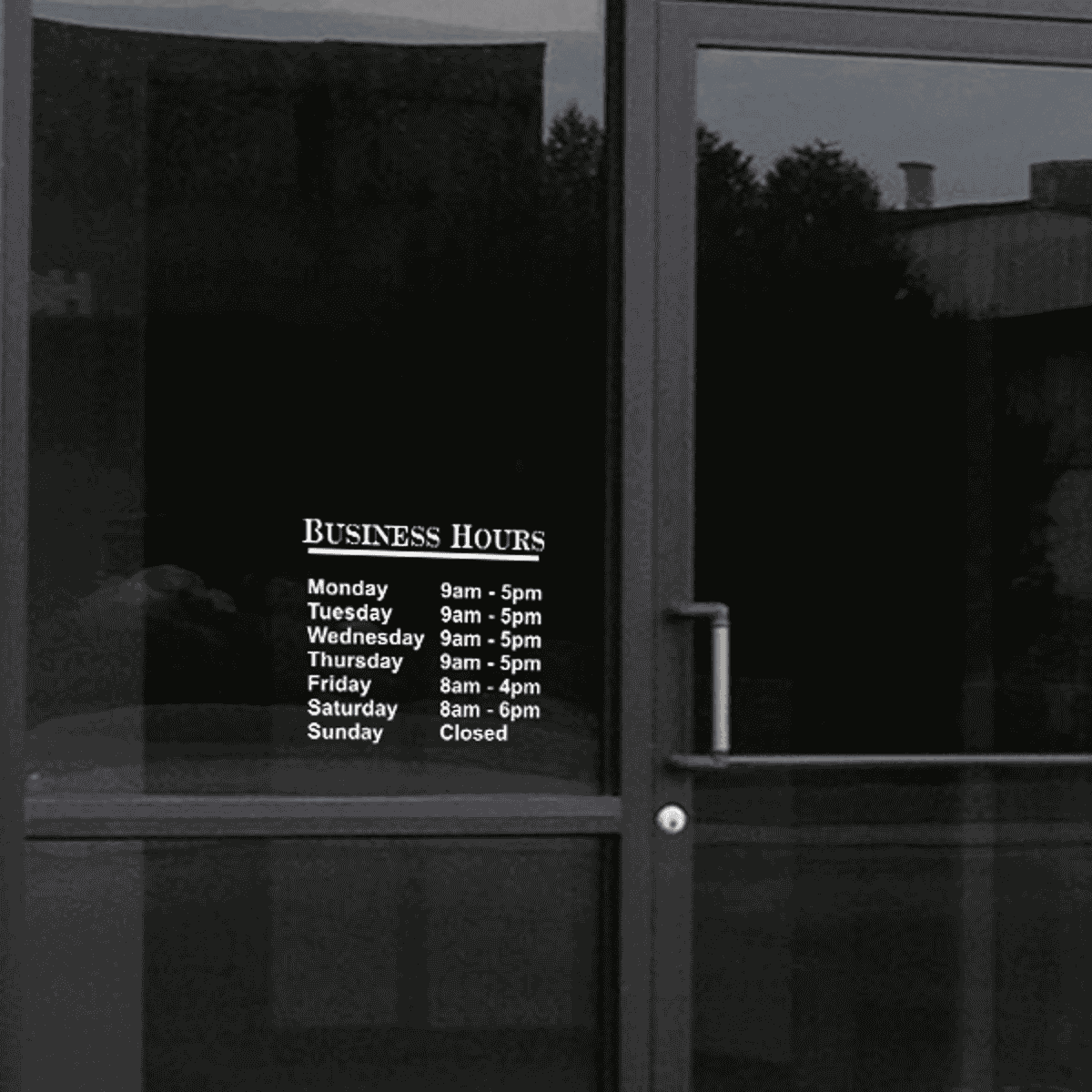 Standard Business Hours Die Cut Door Decal on a storefront window