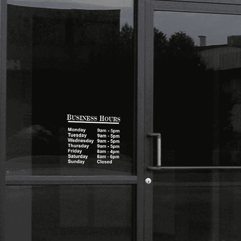 Standard Business Hours Die Cut Door Decal on a storefront window