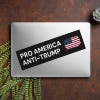 Pro America Anti Trump bumper sticker on a closed laptop