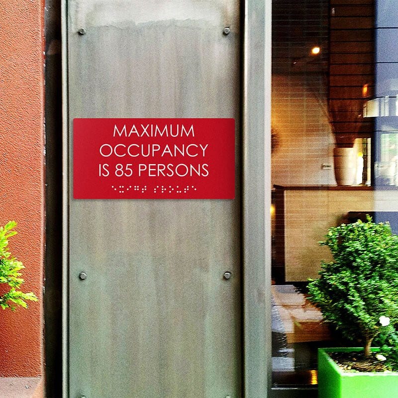 Custom ADA sign for a maximum occupancy warning