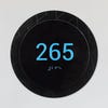 An example of a small round 2-layer ADA sign for a room number