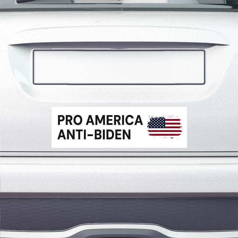 Pro America Anti-Biden bumper sticker on the bumper of a white car