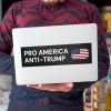 Pro America Anti Trump bumper sticker on a laptop