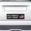 Pro America Anti Trump bumper sticker on the bumper of a white car