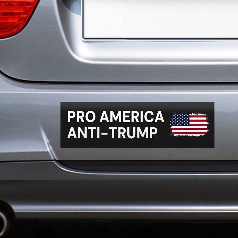 Pro America Anti Trump bumper sticker on the bumper of a gray car