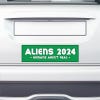 Aliens - Humans Aren't Real Bumper Sticker on the bumper of a white car