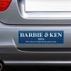 Barbie and Ken bumper sticker on the bumper of a gray car