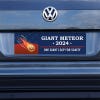 Giant Meteor Bumper Sticker on a gray car