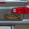 Camo MAGA Bumper Sticker below a gray car's tail light