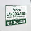 A custom car magnet with border for a landscaping business