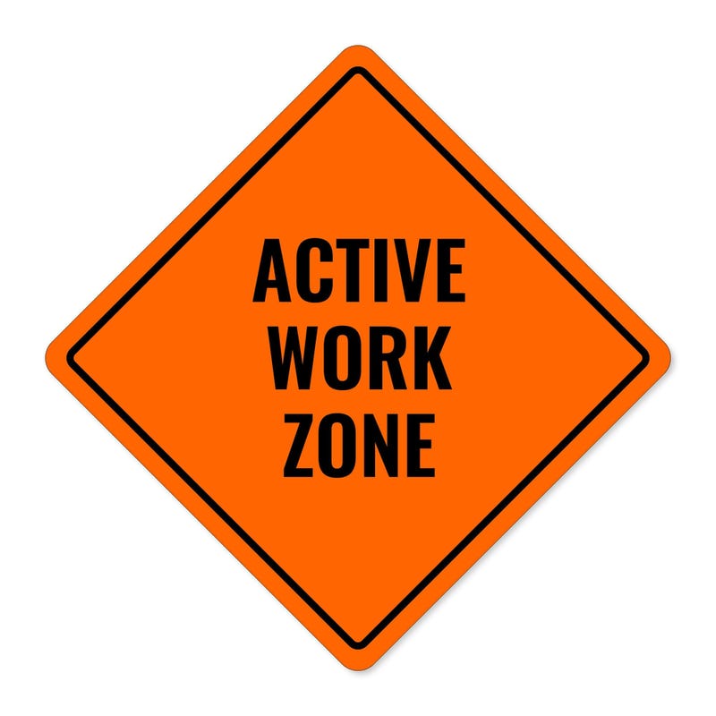 Orange aluminum sign with the message of an active work zone