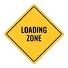 A yellow diamond sign with the message LOADING AREA