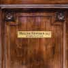 2x10 custom engraved brass sign displayed on a door