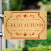 4x6 printed brass sign displayed on a pole
