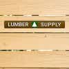 1" x 8" custom plastic sign for a lumber company